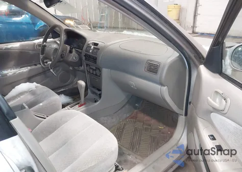 2001 Toyota Corolla Le z USA, uszkodzony, nr VIN 2T1BR12E61C453995